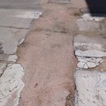 Buche e rattoppi stradali tra via Toselli e via Firenze. Residenti indispettiti